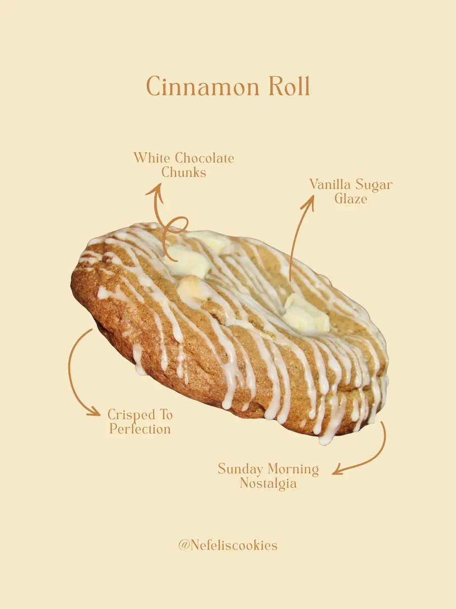 Cinnamon Roll cookie with white chocolate chunks and vanilla glaze